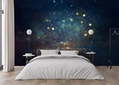 background of abstract glitter lights. gold, blue and black. de focused Wall mural