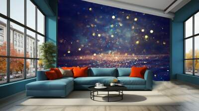 background of abstract glitter lights. gold, blue and black. de focused Wall mural