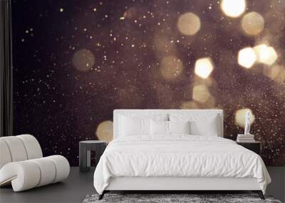 background of abstract glitter lights. gold and black. de focused. banner Wall mural