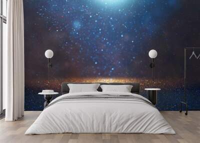 blackground of abstract glitter lights. blue, gold and black. de focused Wall mural