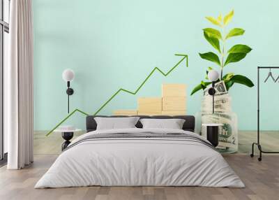 Business image of plant growing in savings jar, money investment and financial growth concept Wall mural