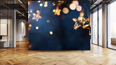 Christmas warm gold garland lights over dark background with glitter overlay Wall mural