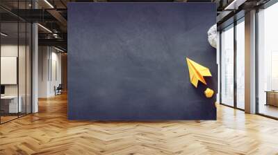 Education concept image. Creative idea and innovation. Light bulb as metaphor over blackboard Wall mural