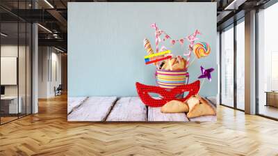 hamantaschen cookies or hamans ears,noisemaker and mask for purim celebration (jewish carnival holid Wall mural