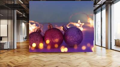 Image of christmas festive tree gold, purple and violet balls decoration. Wall mural