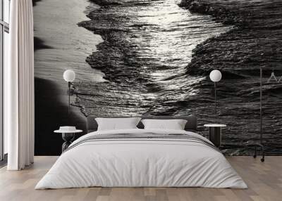 low key image of sea waves pattern, black and white. Wall mural