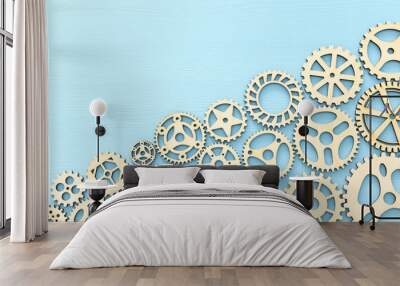 photo of working system of cogwheels,concept of teamwork, wooden textured background Wall mural