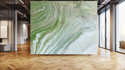 photography of abstract marbleized effect background. green and white creative colors. Beautiful paint Wall mural