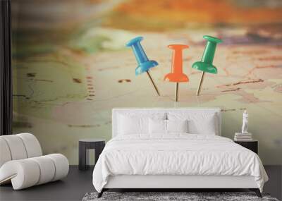 pins attached to map, showing location or travel destination . retro style image. selective focus.
 Wall mural