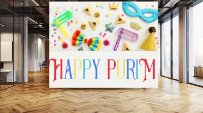 Purim celebration concept (jewish carnival holiday) over wooden white background. Top view, flat lay Wall mural