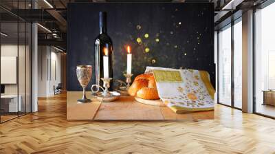 sabbath image. challah bread and candelas on wooden table Wall mural