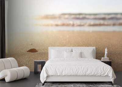 Sea waves and warm sunset light, calm and relaxing sandy beach Wall mural