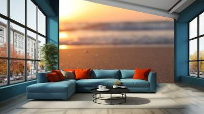 Sea waves and warm sunset light, calm and relaxing sandy beach Wall mural