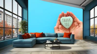 top view image holding heart with the text thank you Wall mural