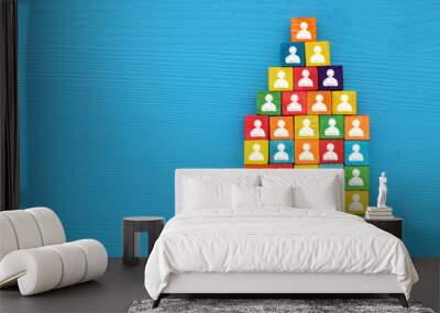 top view image of a wood blocks pyramid with people icons , human resources and management concept. Wall mural