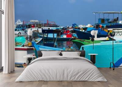 A lot of colored boats in the harbor of Male fish market (Maldives, Asia) Wall mural