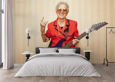 cool fashion elder lady with electric guitar Wall mural