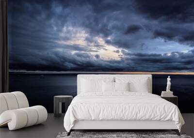 Dramatic panoramic view of the sea and moody cloudy sky Wall mural