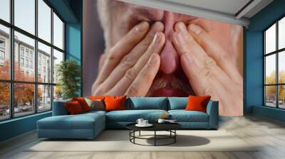 Close up portrait of grey haired senior man rubbing eyes feeling fatigue Wall mural