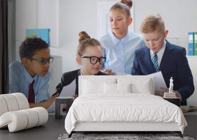 Young diverse businessmen at board meeting in office. Wall mural