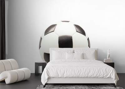 A classic black and white soccer ball isolated on a plain background, perfect for sports and recreation themes in stock photography. Wall mural