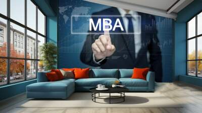 Businessman hand touching MBA button on virtual screen Wall mural