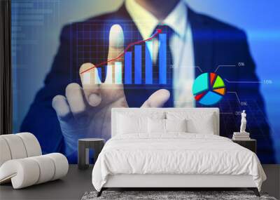 Businessman hand touching virtual graph on media screen Wall mural