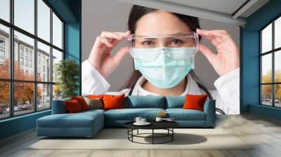 Close up of Doctor face with surgical mask Wall mural