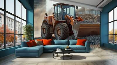 A skid steer loader emptying an excavator bucket of gravel during construction Wall mural