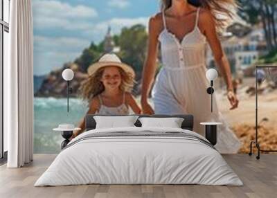 Happy mother and daughter having fun on their summer vacation. The idea of a family vacation and trip. Wall mural