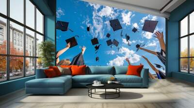 Students throwing their caps skyward upon graduation Wall mural