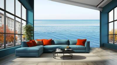 Blue ocean and blue sky background Wall mural