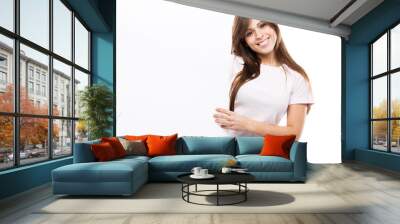 Portrait of a young woman with blank billboard Wall mural