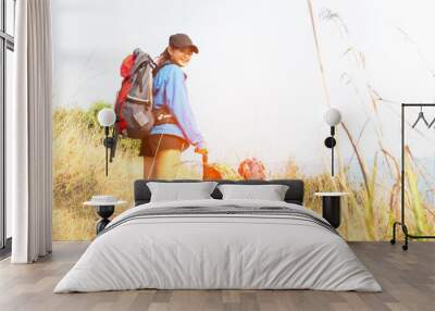 Traveler sightseeing the beautiful scenery of nature .Travel and Lifestyle Concept Wall mural