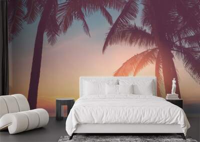 Beautiful tropical beach with palm tree on sunset twilight sky clouds abstract background. Wall mural