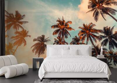 Copy space of tropical palm tree with sun light on sky background. Wall mural