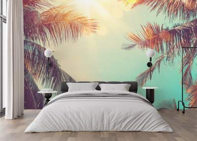 Copy space of tropical palm tree with sun light on sky background. Wall mural