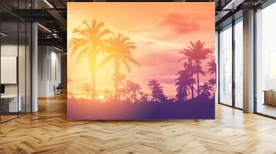 Copy space of tropical palm tree with sun light on sky background. Wall mural