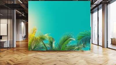 Copy space of tropical palm tree with sun light on sky background. Wall mural