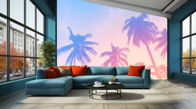 Copy space of tropical palm tree with sun light on sky background. Wall mural