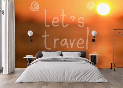 Let 's travel word hand writing on blur tropical sunset beach abstract background. Wall mural