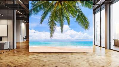 Palm tree at tropical beach on blue sky abstract background. Summer vacation and nature travel adventure concept. Wall mural