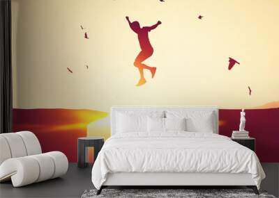 Silhouette man jumping between cliff at top of mountain background with birds flying. Freedom challenge and travel adventure concept. Wall mural