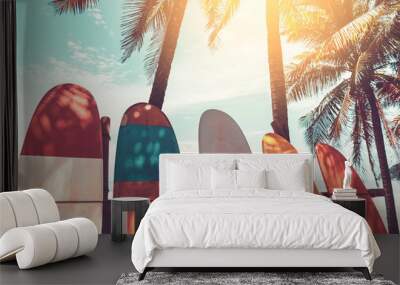 Surfboard and palm tree on beach background. Wall mural