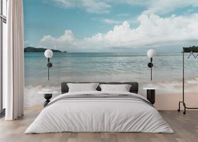 Tropical beach with blue sky and white cloud background. Wall mural