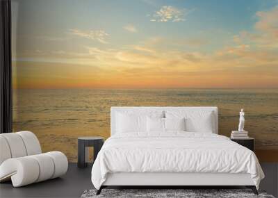 Tropical beach with smooth wave and sunset sky abstract background. Wall mural