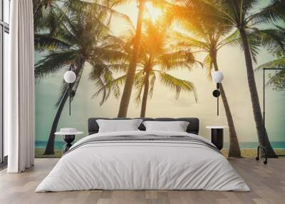 Tropical palm tree on beach background. Wall mural