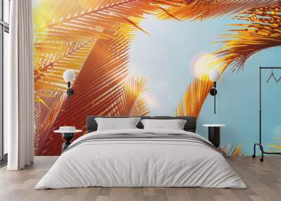 Tropical palm tree with blue sky and cloud abstract background. Summer vacation and nature travel adventure concept. Wall mural