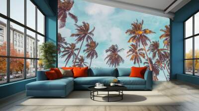 Tropical palm tree with blue sky and cloud abstract background. Summer vacation and nature travel adventure concept. Wall mural