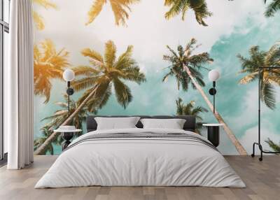 Tropical palm tree with sun light on sunset sky and cloud abstract background. Wall mural